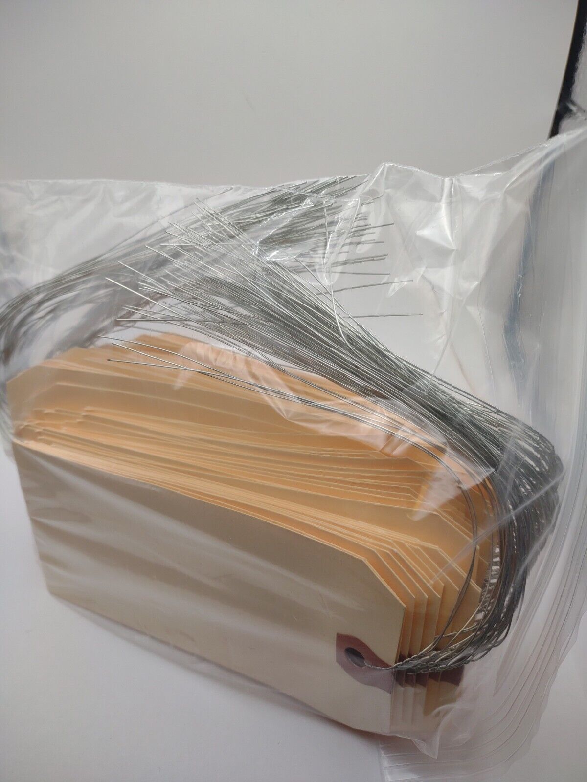 Lots of (100) No. #5 Manila Reenforced Wire Tags - Luggage - Inventory - Ship