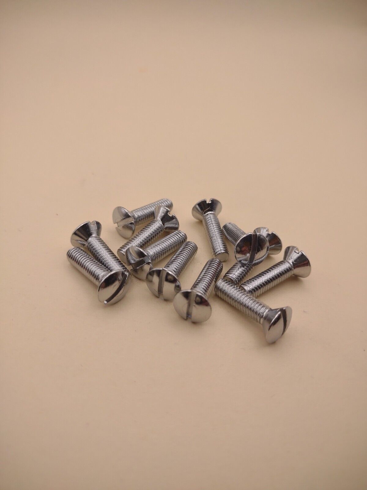 10-24 x 3/4" Oval Head Slotted Chrome Brass Machine Screws (12 pack) NOS CBMS12
