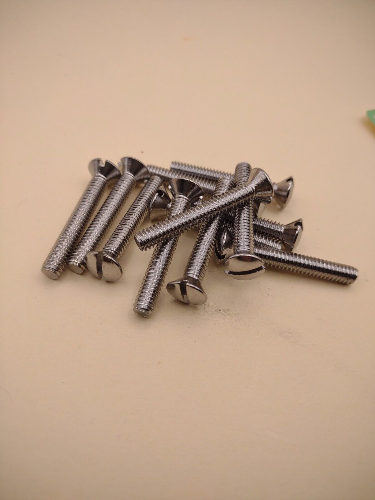 12-24 x 1-1/2" Oval Head Slotted Chrome Brass Machine Screws (12 pack NOS CBMS41