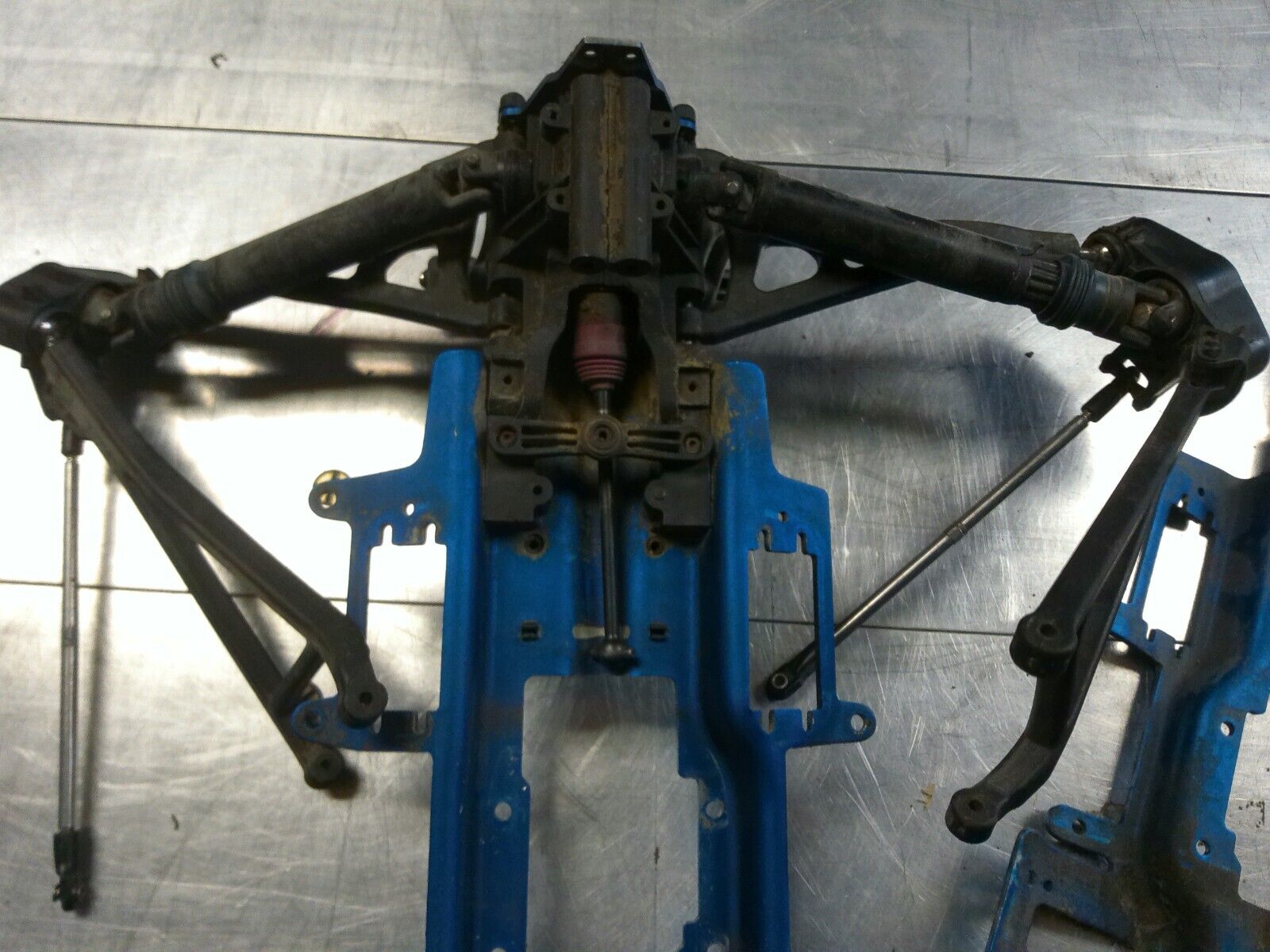 Lot of used Traxxas Revo Frame / Chassis Plates and Parts, Dirty but reusable
