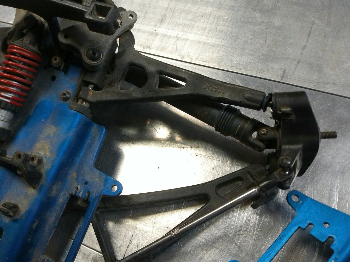 Lot of used Traxxas Revo Frame / Chassis Plates and Parts, Dirty but reusable